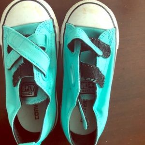 Teal converse sneakers